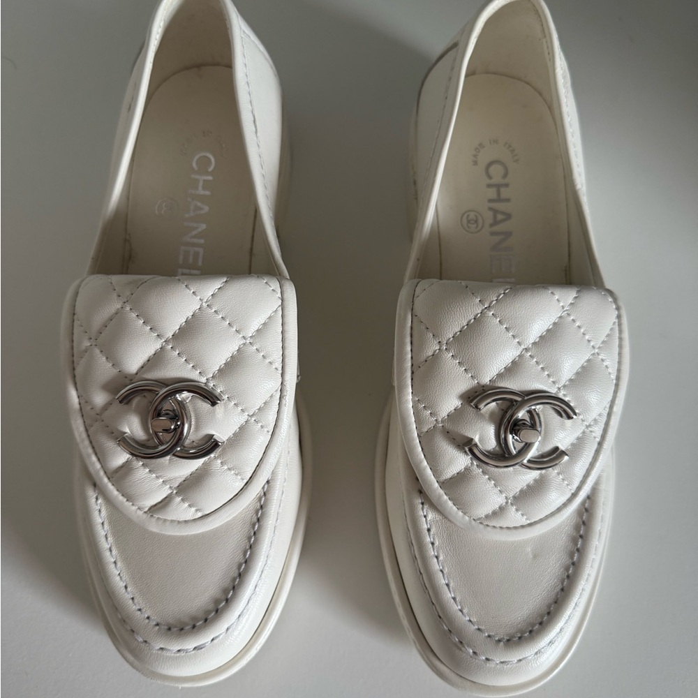CHANEL Cream Quilted Loafers with Silver Logo